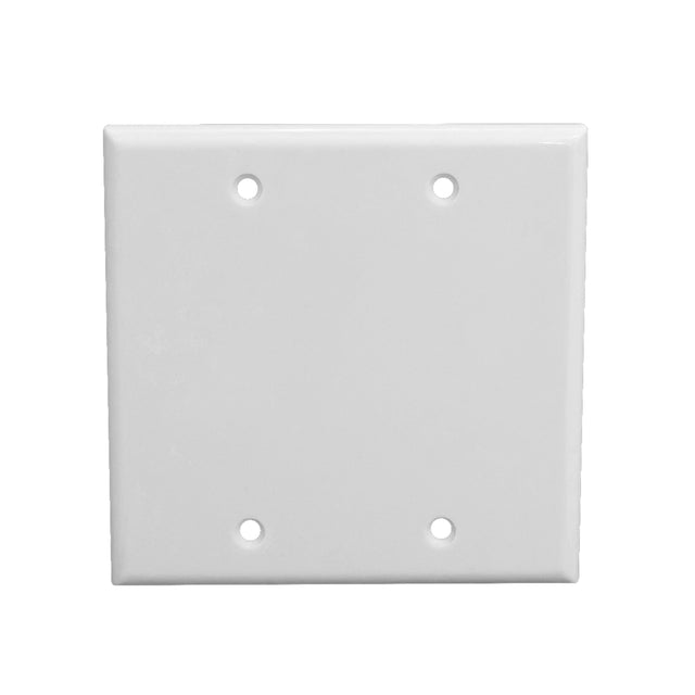 White wall plate with three holes on a white background