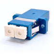 A blue LC/UPC Duplex OM3 Multimode SC Footprint Fiber Optic Coupler with Flange, featuring white connectors.
