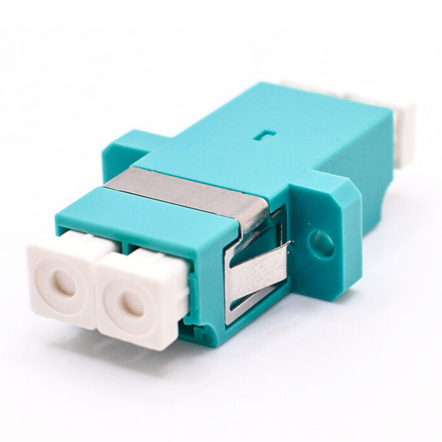 A blue LC/UPC Duplex Single Mode Coupler with Flange for fiber optic connections.